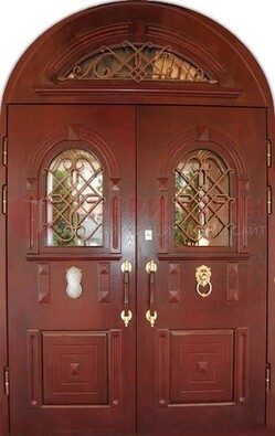 Стальная арочная дверь со стеклом и ковкой ДА-30 в дом из кирпича в Королеве