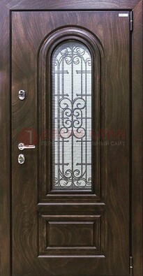 Темная филенчатая железная дверь со стеклом и ковкой ДСК-102 в Королеве
