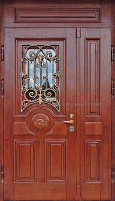 Филенчатая железная дверь со стеклом и ковкой ДСК-204 в Королеве