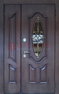 Темная металлическая дверь Винорит со стеклом и ковкой ДСК-239 в Королеве