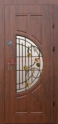 Стальная коричневая дверь с виноритом и ковкой ДВТ-82 в Королеве